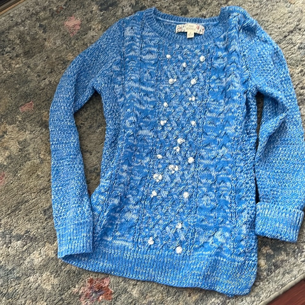 Very cute blue sweater with small diamonds